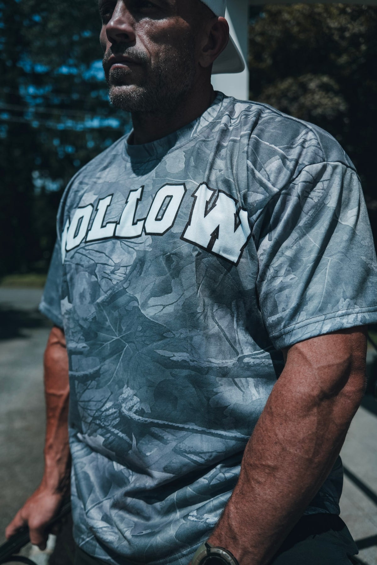 Side detail of Hollow woodland camo tee showing sleeve and chest print